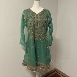 Two piece formal salwar kameez in a soft sea-green shade with intricate gold